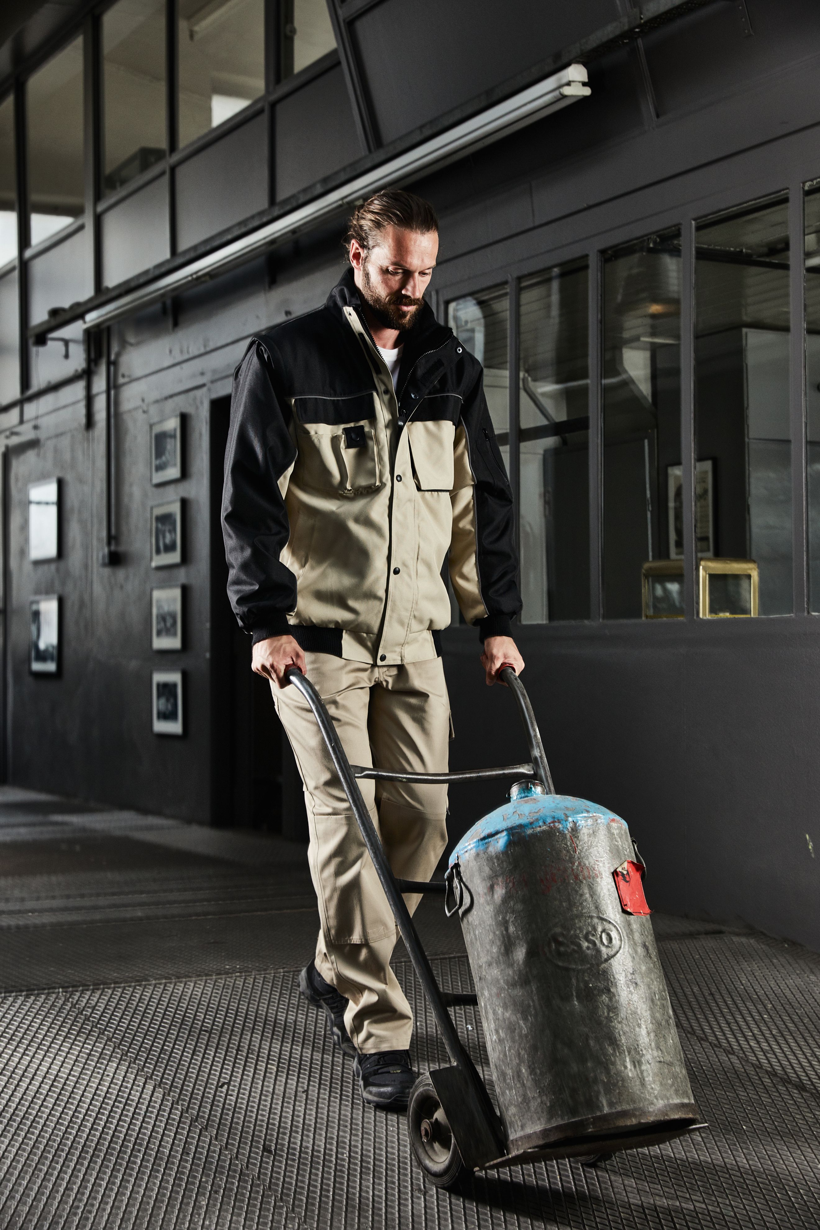 Workwear Jacket JN810 Robuste, wattierte Jacke mit abnehmbaren Ärmeln Workwear Jacket JN810 Robuste, wattierte Jacke mit abnehmbaren Ärmeln